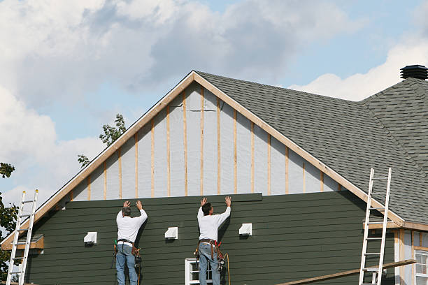 Professional Siding technician working in Forest City, PA